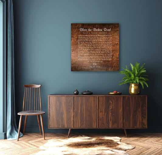 Wall decor-  wood plaque with custom wording on a stained birch finish, hangs on a teal wall above a wooden bureau.