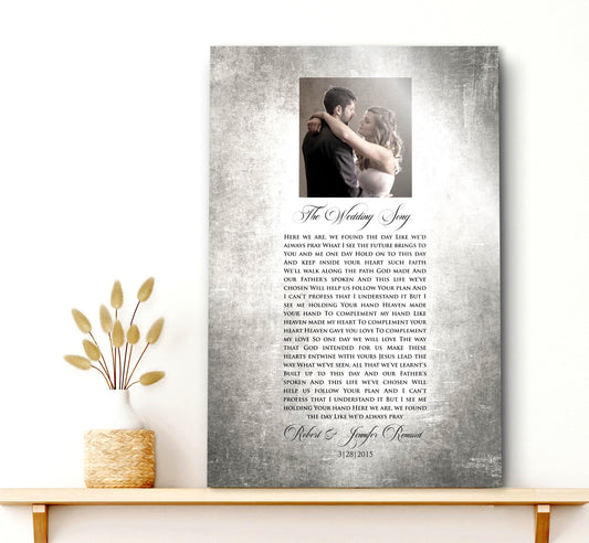 Custom Portrait plaque on tin for couples. Features the song lyrics or wording of choice and a photo cameo above the lyrics. This piece is handcrafted on vintage tin and is displayed on a single shelf with a rustic vase on the shelf to the left.

Courtesy of Honeycomb Proverbs